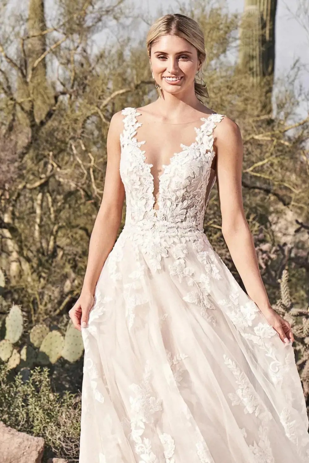 Photo of model wearing a white gown by Eddy K