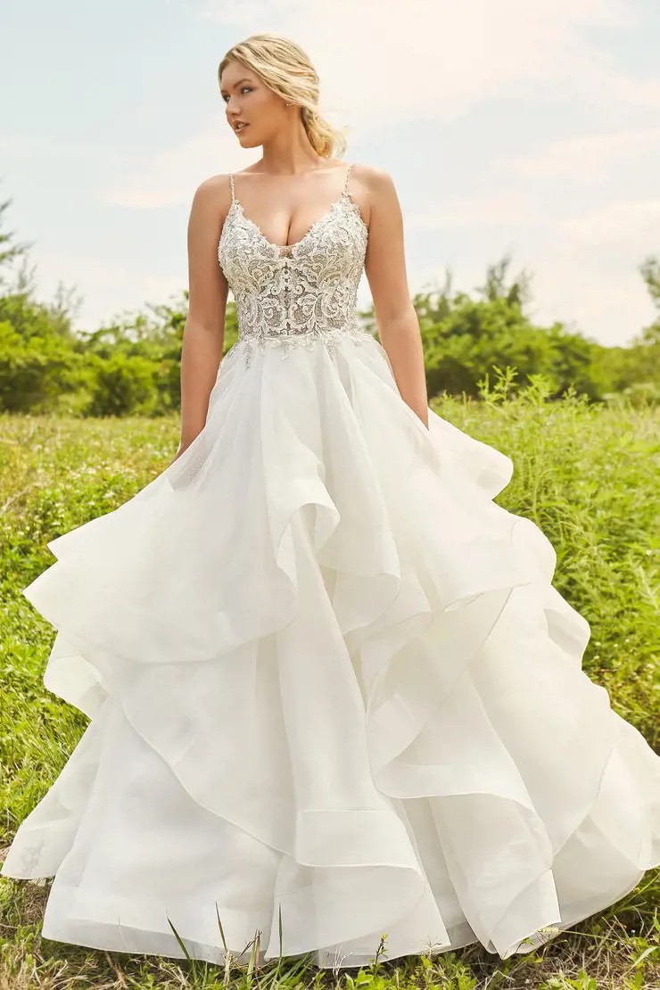 Photo of model wearing a white gown by Martin Thornburg