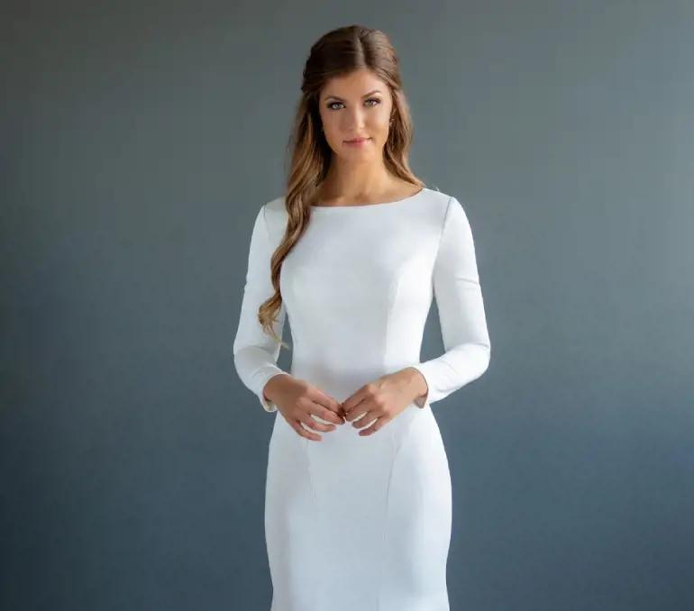 Photo of model wearing a capped sleeves style gown